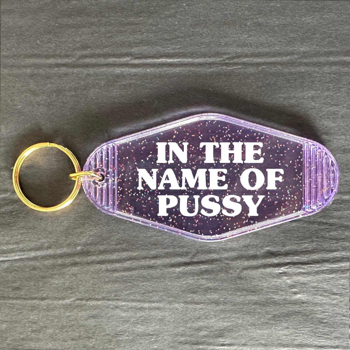 IN THE NAME OF PUSSY KEYRING